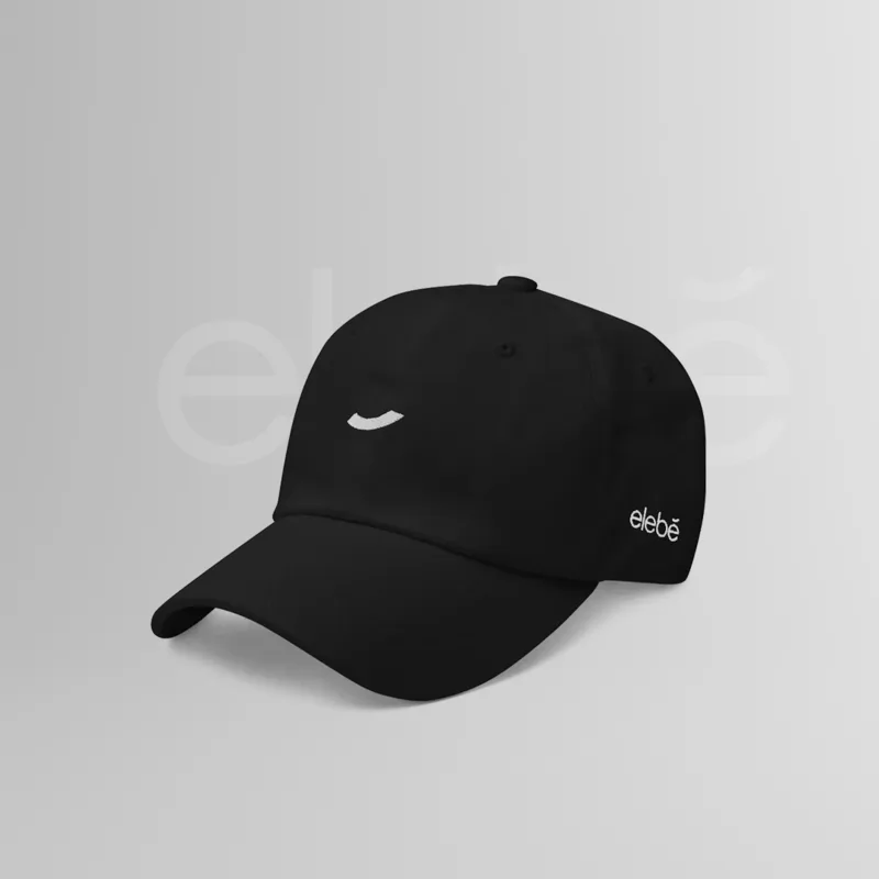 A black six-panel cap, the elebe curve embroidered small on the crown and the wordmark on the side panel.