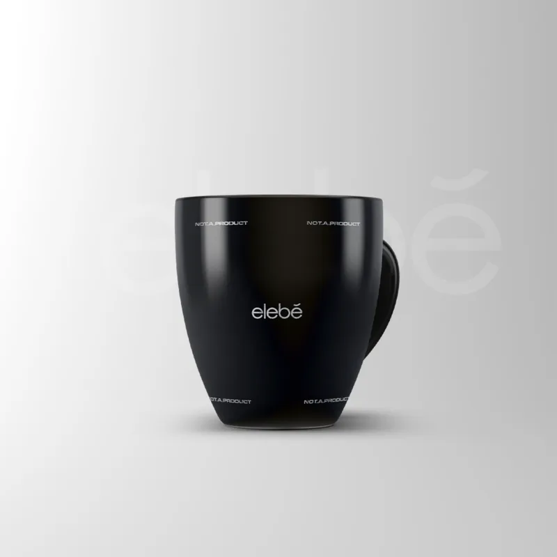 A tapered black mug, the elebe wordmark centred and NOT.A.PRODUCT set at each corner.
