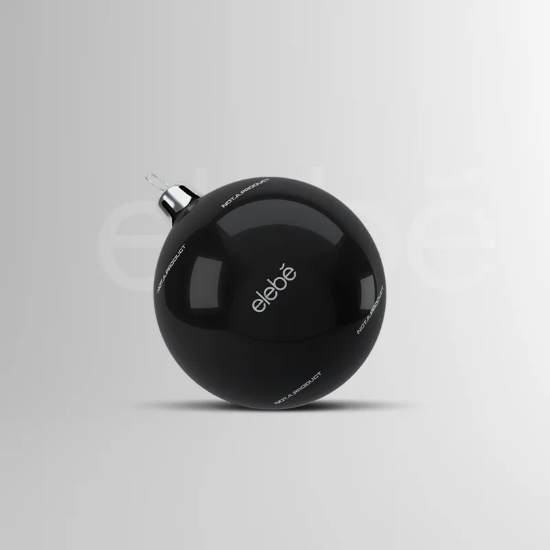 A glossy black bauble with a silver cap, the elebe wordmark centred and NOT.A.PRODUCT circling it.